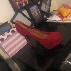 Red pumps with platform